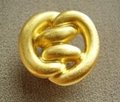 Gilded metallic button