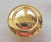 Bright gold metallic effect button