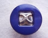 Dyed button, centre metallic effect detail