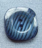Lined opaque button