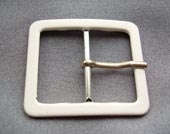 White faux leather buckle